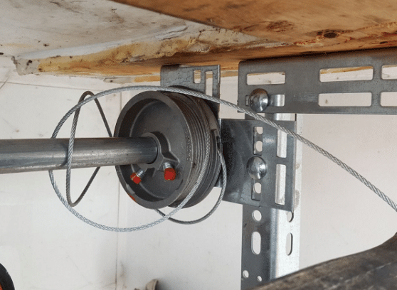 how to fix the garage door cable