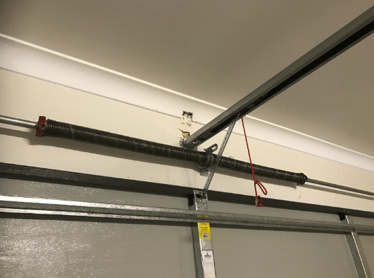 how many turns on a garage door spring